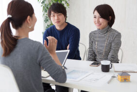 Asian-Chinese-couple-talking-to-Consultant